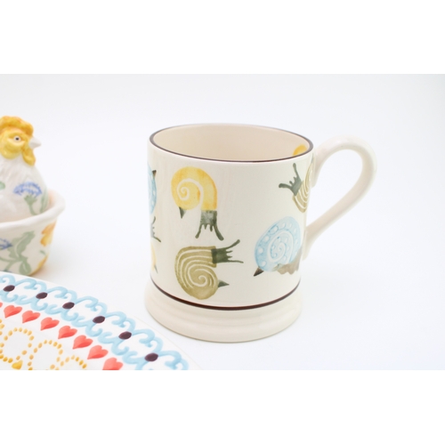 17 - Emma Bridgewater to include a large serving platter, 34cm diameter with rocking horse, a mini duck c... 