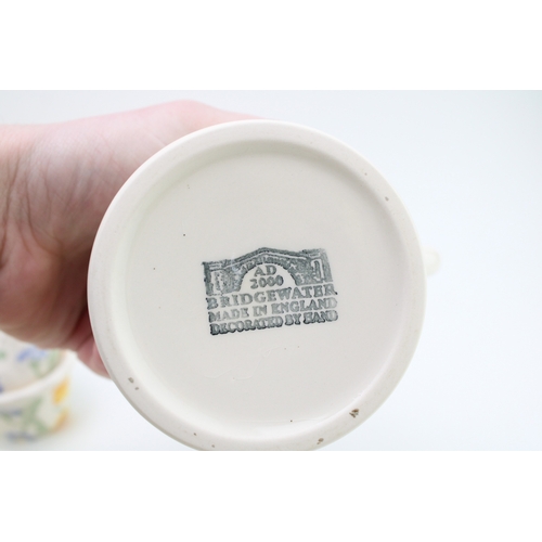 17 - Emma Bridgewater to include a large serving platter, 34cm diameter with rocking horse, a mini duck c... 