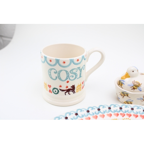 17 - Emma Bridgewater to include a large serving platter, 34cm diameter with rocking horse, a mini duck c... 
