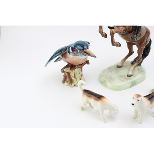 23 - Two Beswick rearing huntsman 868 together with four hounds, kingfisher and robin a/f, (Qty).