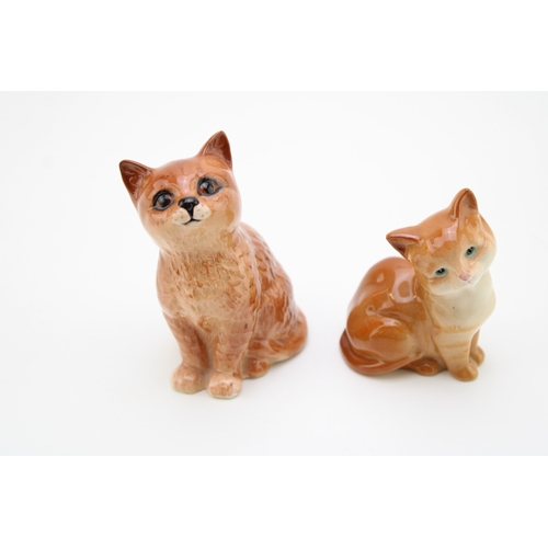 25 - Beswick cat 1867 in ginger together with two kittens, 20cm tall, (3).