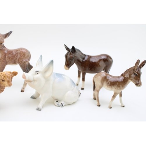 30 - Beswick animals to include Highland calf 1827, three donkeys together with the sitting pig 832,13cm ... 