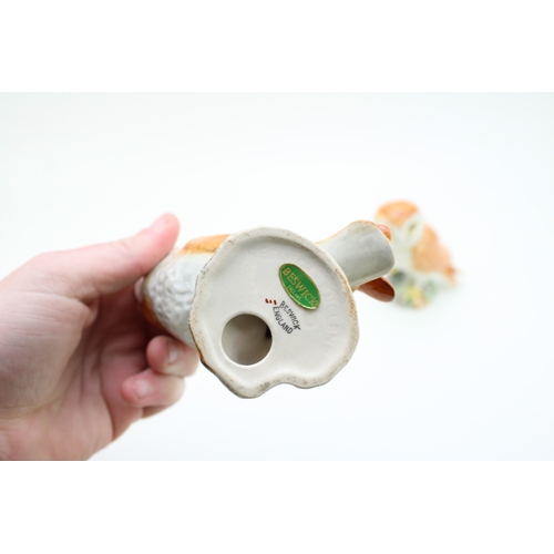 35 - Beswick barn owls to include large model 1046 together with two smaller versions, 18.5cm tall, (3).