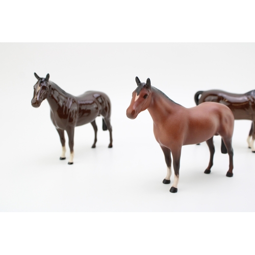 37 - Three Beswick brown horses including two in gloss and one in matte (3).