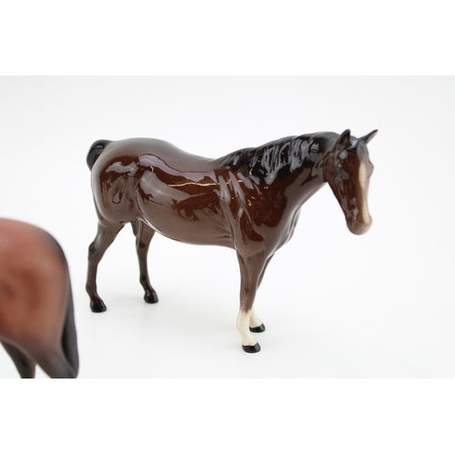 37 - Three Beswick brown horses including two in gloss and one in matte (3).