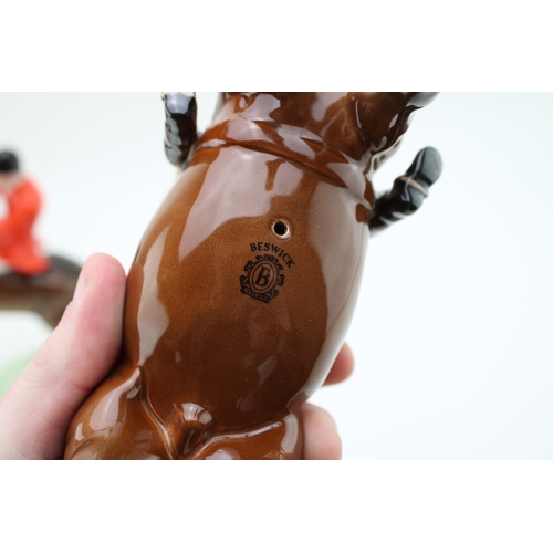38 - A Beswick huntsman on brown horse, 1501, with a rearing huntsman 868 (2 - rearing huntsman legs af).