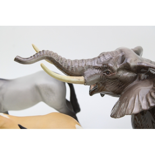 40 - Beswick to include a large elephant with tusks and three Bois Roussell figures, in brown and matte g... 