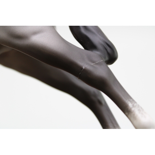 40 - Beswick to include a large elephant with tusks and three Bois Roussell figures, in brown and matte g... 