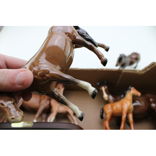 41 - Beswick to include a mare and foal on ceramic base, First Born, a boy's walking pony in brown, a She... 