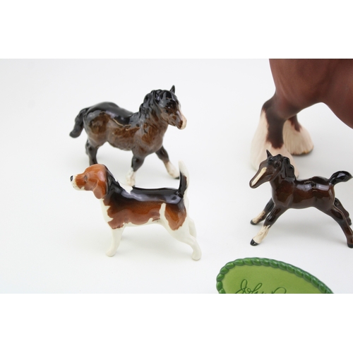 43 - Beswick to include a matt brown 818 shire, a sitting fox, a comical donkey foal, two points of sale ... 