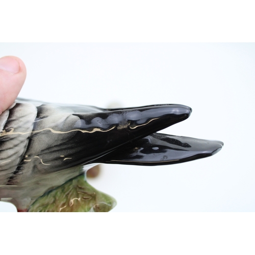 49 - Two Beswick pigeons, 1383, in grey and brown (2 - both restored).