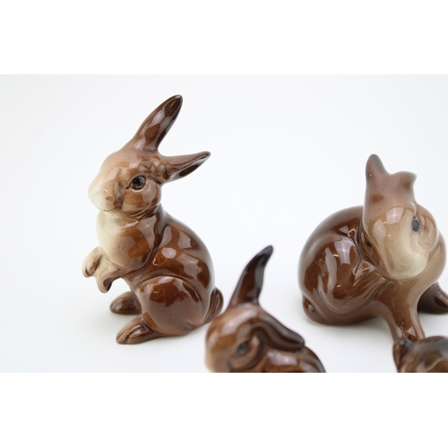 51 - Beswick family of rabbits (4).