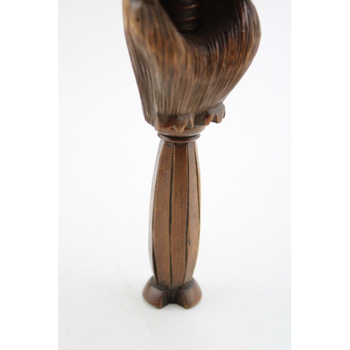 20A - 19th century fruitwood screw-action novelty nut cracker in the form of a squirrel, 17cm tall.