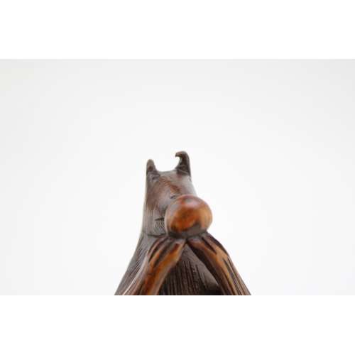 20A - 19th century fruitwood screw-action novelty nut cracker in the form of a squirrel, 17cm tall.