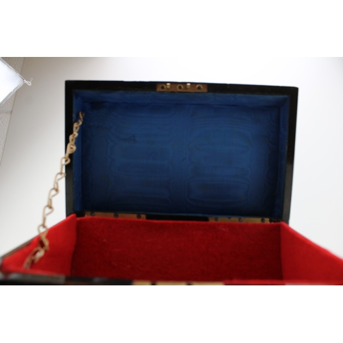 14 - A Victorian coromandel stationary box with Japerware insert to lid, with brass bound decoration, lat... 