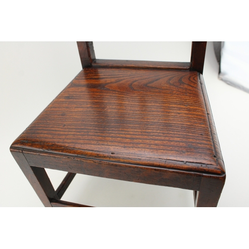 15 - A Georgian oak child's chair with vernacular sides, charming antique repair noted to reverse, 54cm t... 