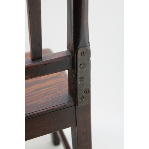15 - A Georgian oak child's chair with vernacular sides, charming antique repair noted to reverse, 54cm t... 