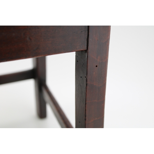 15 - A Georgian oak child's chair with vernacular sides, charming antique repair noted to reverse, 54cm t... 