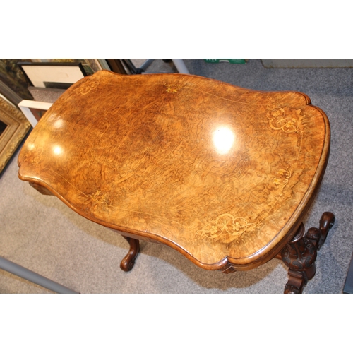 15A - A Victorian burr walnut stretcher card table, featuring serpentine-shaped top with walnut veneer and... 