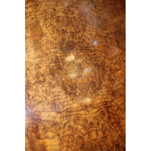 15A - A Victorian burr walnut stretcher card table, featuring serpentine-shaped top with walnut veneer and... 