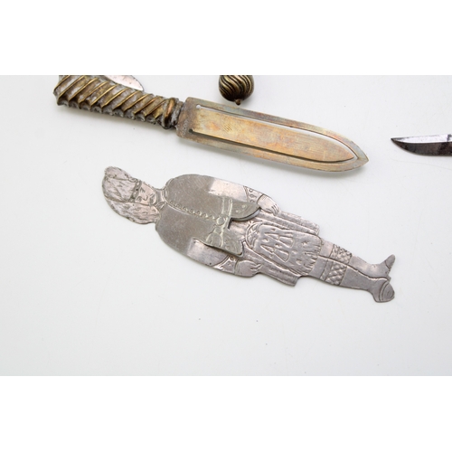 37 - A collection of 'bookmarks' comprising agate set examples on brass and base metal, tartan-ware (in t... 