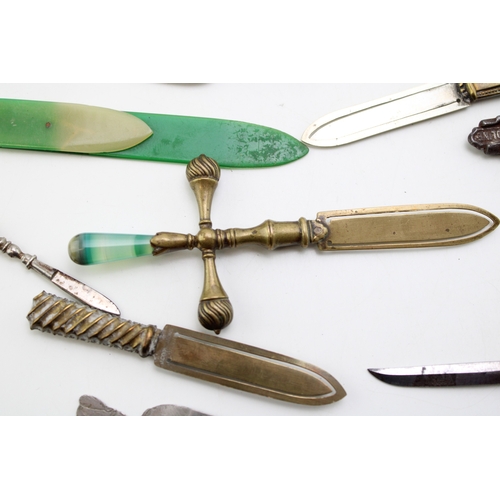 37 - A collection of 'bookmarks' comprising agate set examples on brass and base metal, tartan-ware (in t... 