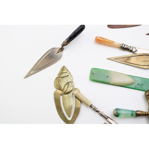 37 - A collection of 'bookmarks' comprising agate set examples on brass and base metal, tartan-ware (in t... 
