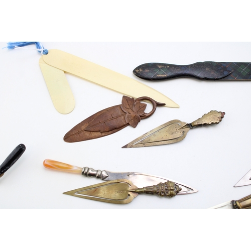 37 - A collection of 'bookmarks' comprising agate set examples on brass and base metal, tartan-ware (in t... 