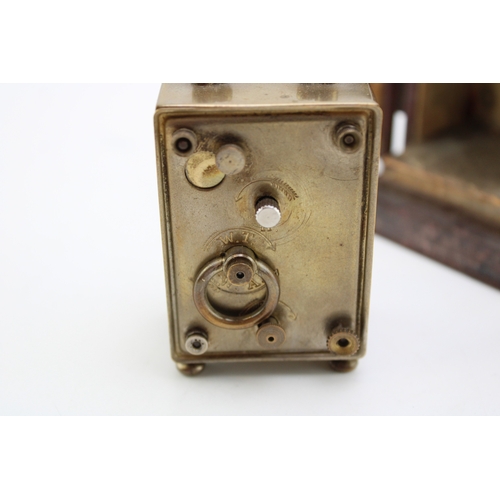 50 - A cased late 19th century carriage clock in fitted case with velvet interior, with large dial with e... 