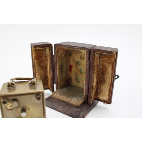 50 - A cased late 19th century carriage clock in fitted case with velvet interior, with large dial with e... 