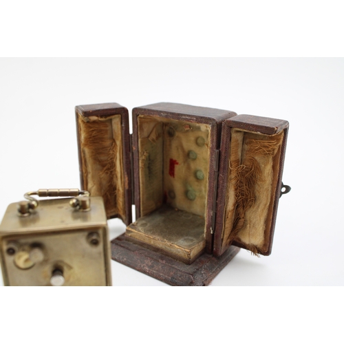 50 - A cased late 19th century carriage clock in fitted case with velvet interior, with large dial with e... 