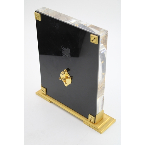 51 - Jaeger le Coultre, a mid 20th century Perspex cased 'Marina' eight day mantle clock, raised on squar... 