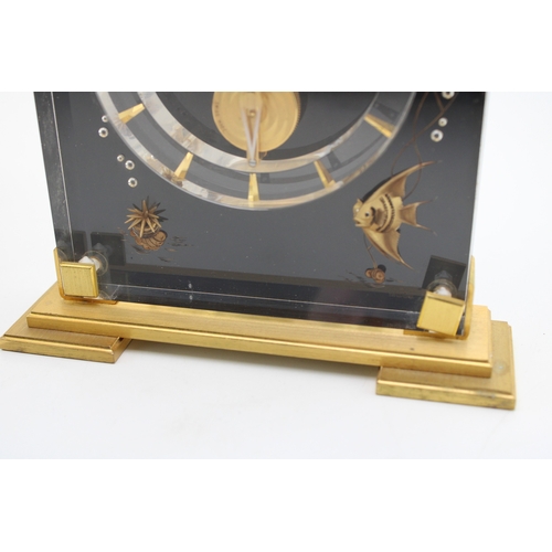 51 - Jaeger le Coultre, a mid 20th century Perspex cased 'Marina' eight day mantle clock, raised on squar... 