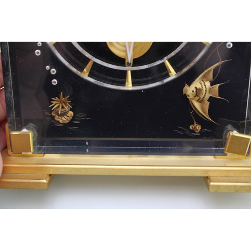 51 - Jaeger le Coultre, a mid 20th century Perspex cased 'Marina' eight day mantle clock, raised on squar... 
