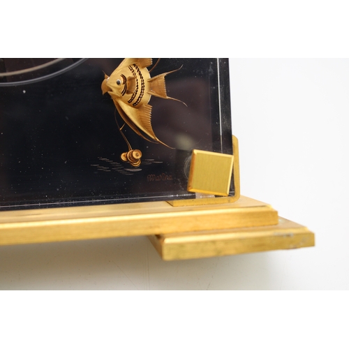 51 - Jaeger le Coultre, a mid 20th century Perspex cased 'Marina' eight day mantle clock, raised on squar... 