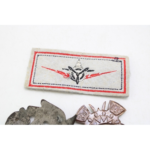 33 - A South African Memorable Order of Tin Hats (MOTH) an Overseas Dominions Cap Badge with another Avia... 