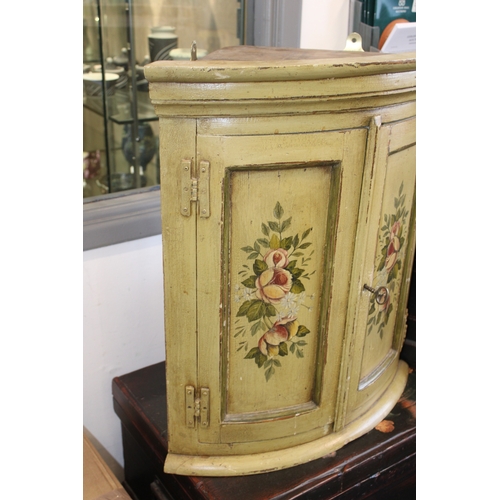 53 - A mid 20th century pine bow-fronted corner cupboard with later applied painted decoration shabby chi... 