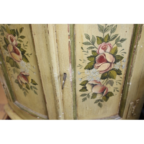53 - A mid 20th century pine bow-fronted corner cupboard with later applied painted decoration shabby chi... 