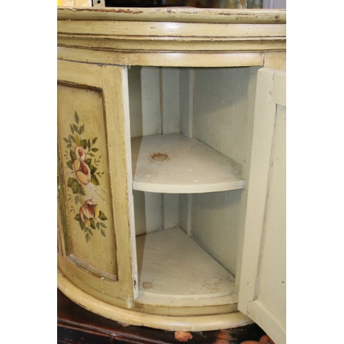 53 - A mid 20th century pine bow-fronted corner cupboard with later applied painted decoration shabby chi... 