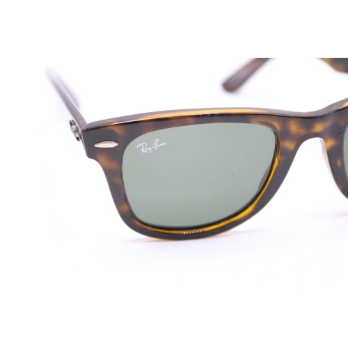 57 - A pair of Ray-Ban tortoiseshell Wayfarer sunglasses, made in Italy, RB 4340 50 22 150 3N.