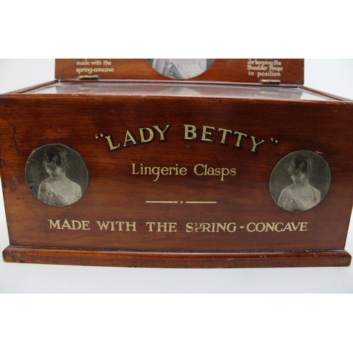 2 - An Edwardian lingerie counter top display case with glazed top and four long drawers for 
