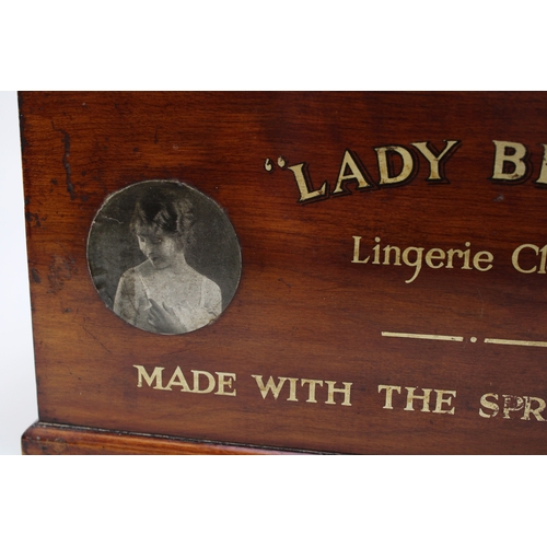 2 - An Edwardian lingerie counter top display case with glazed top and four long drawers for 