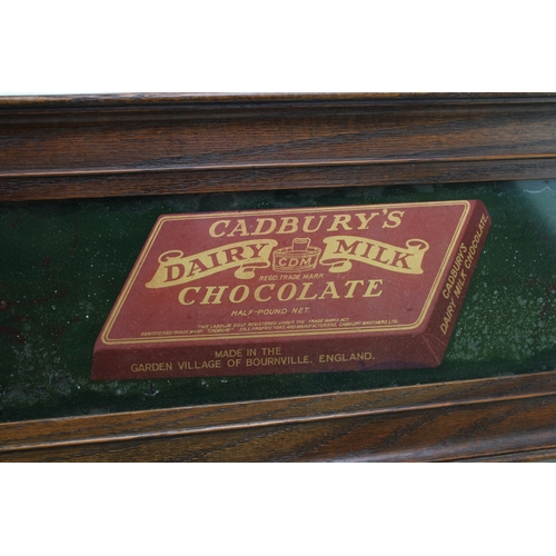 5 - Cadbury's 'Dairy Milk' Chocolate, early 20th century shop fitting advertising glass panel A912, in o... 