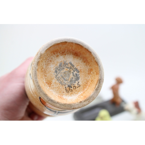 329 - Beswick to include a dachshund ashtray and a comical dog with a Doulton Terrier HN1031, a Wade chick... 