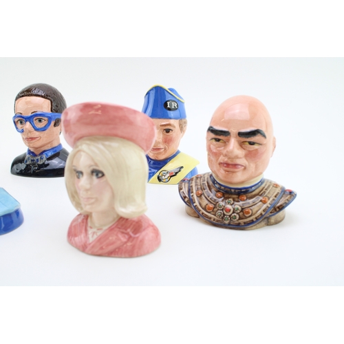 330 - Beswick complete set of The Thunderbirds, all set number 422, to include Virgil Tracy, The Hood, Lad... 
