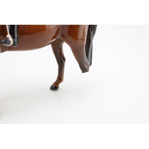331 - Beswick HM Queen Elizabeth II on Chestnut Imperial with a huntswoman on brown (both af but pieces pr... 