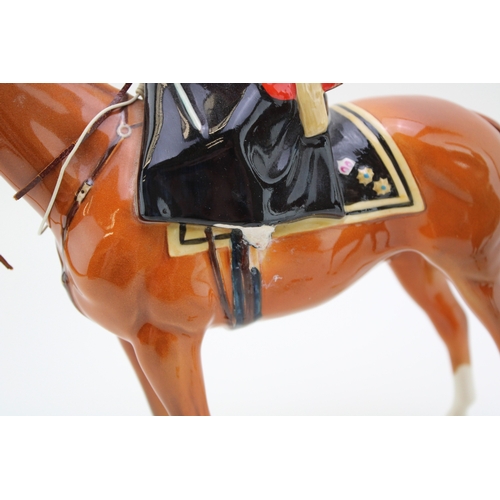 331 - Beswick HM Queen Elizabeth II on Chestnut Imperial with a huntswoman on brown (both af but pieces pr... 