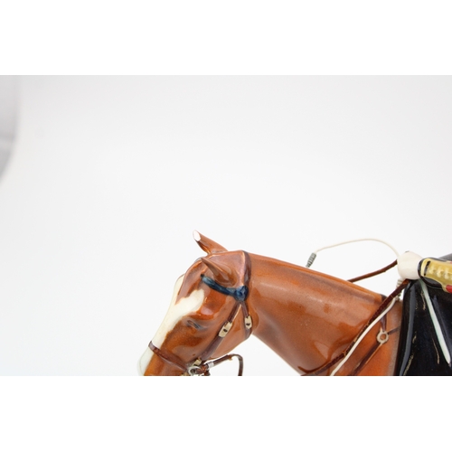 331 - Beswick HM Queen Elizabeth II on Chestnut Imperial with a huntswoman on brown (both af but pieces pr... 