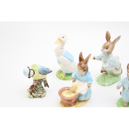 332 - A collection of Beatrix Potter figures to include Beswick Tabitha Twitchit, Cecily Parsley and gold ... 