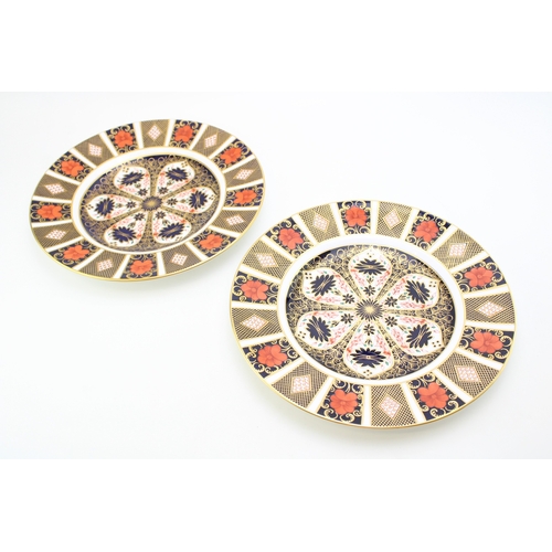 357 - Two Royal Crown Derby 1128 Old Imari dinner plates, 27cm diameter, both firsts.